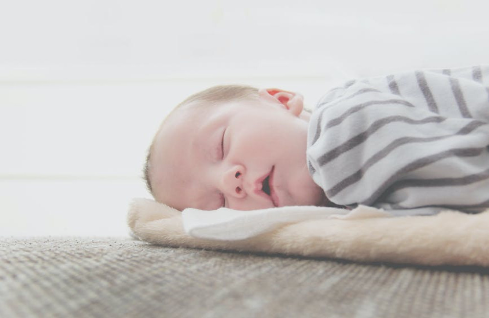Hoe kies ik een goede baby slaapzak?